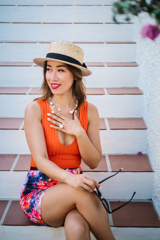 young elegant Chinese woman at mediterranean scenario