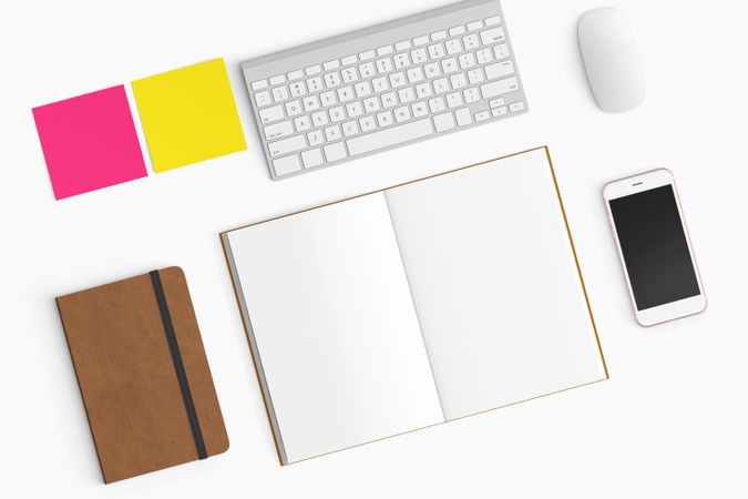 Modern workspace with coffee cup, smartphone, paper, notebook, tablet and laptop copy space