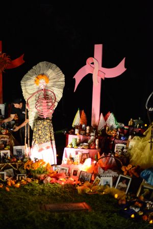 Altar at Day of the Dead event honoring breast cancer