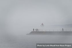 People emerged in fog on the way to a lighthouse on Lake Superior, Minnesota 5zvPk5