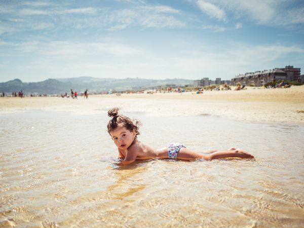 little girl by the seashore