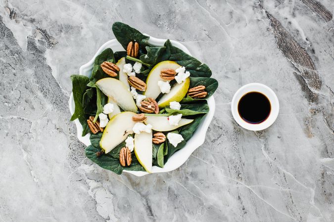Served pears with pecan and soy sauce