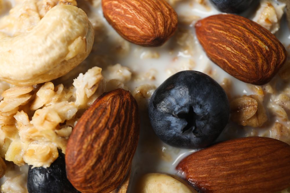 Tasty and nutritious breakfast concept - muesli with yogurt