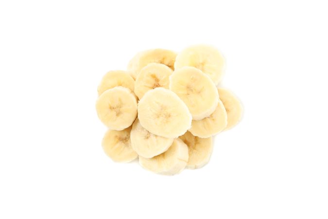 Banana slices isolated on neutral background. Fresh fruit
