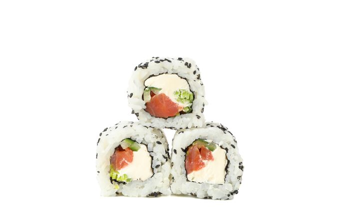 Japanese food. Delicious sushi rolls isolated on light background