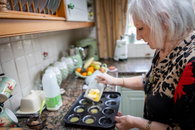 Woman baking in kitchen