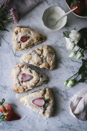 Strawberry scones on marble table