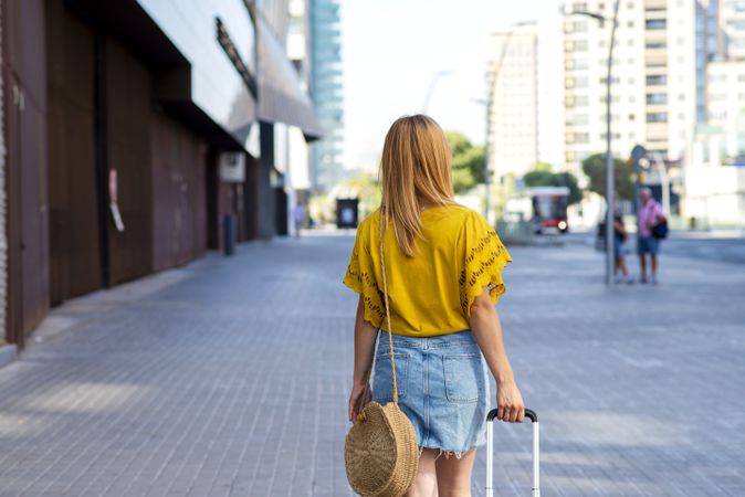 Young woman traveler going on holiday