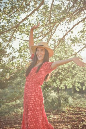 Woman in summer dress in park