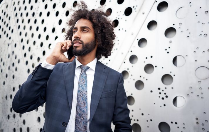Presentable businessman during phone conversation
