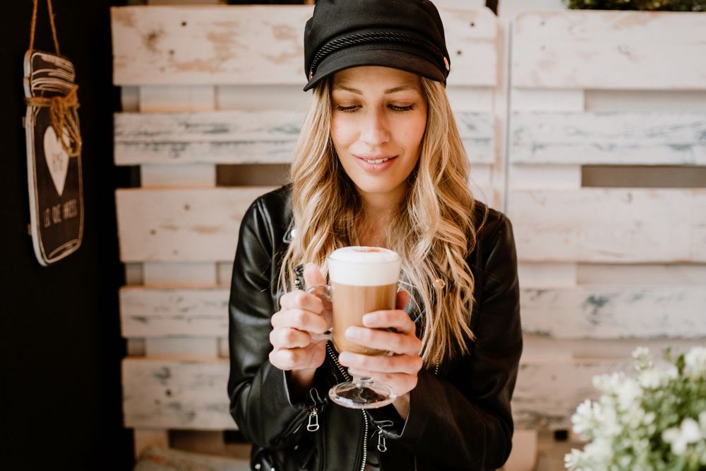 Woman holding coffee in hands