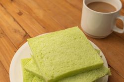 Soft pandan flavored bread and milk coffee