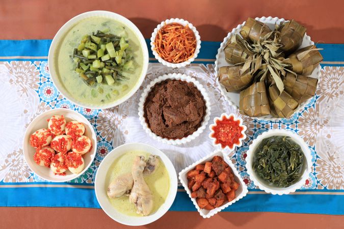 Traditional Indonesian Menu during Eid al Fitr, Ketupat Lebaran, Rendang, Opor, Sambal Goreng.