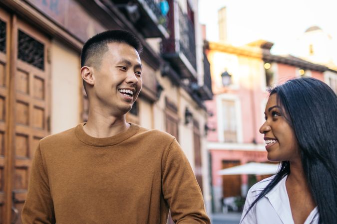 Asian man and Black Latina woman on a date