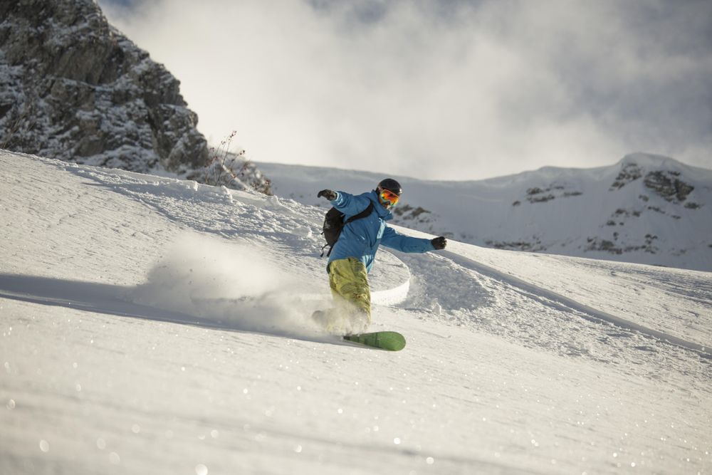 Man skiing on snowboard