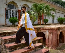 Man standing on concrete stairs outdoor