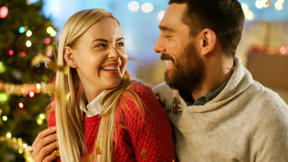 On Christmas Eve Man and Woman Looking at Each Other.