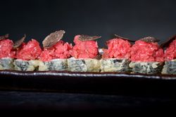 Delicious tempura sushi in row