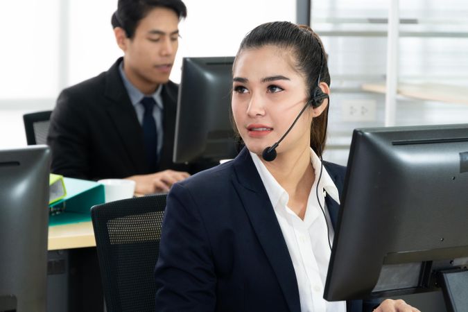 Woman in business call center working in the office