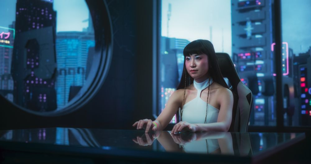 Stylish Japanese Young Woman Interacting with Augmented Reality Platform in a Technologically Advanced Room