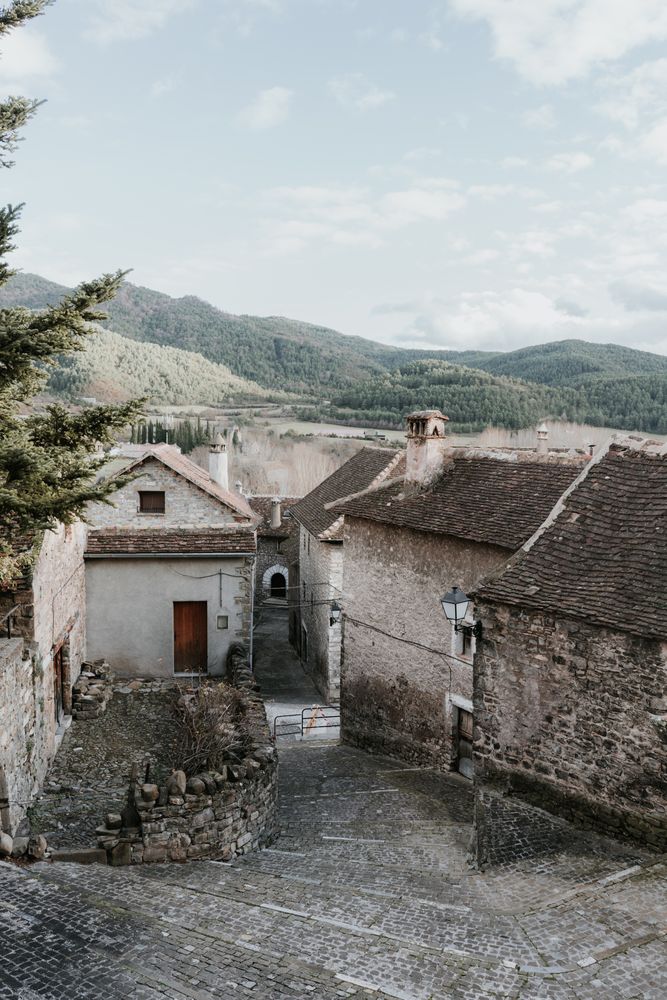 Old buildings in city near mountains