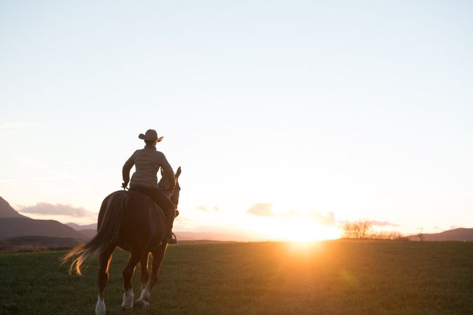 Man and woman riding horses