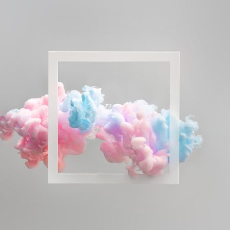 Cloud-like pastel pink and blue color paint with frame on light background