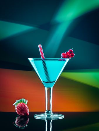 Glass with drink and berries