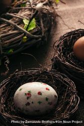 Decorated Easter egg in bird nest 4mvlvb
