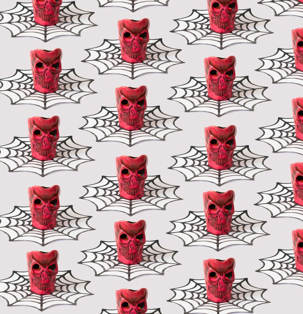 Pattern of red skull in dark ice cream cone in halloween concept