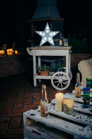 Star lamp with light bulbs on bar cart