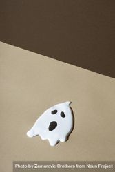 Ghost on beige and brown background 5o19Gb
