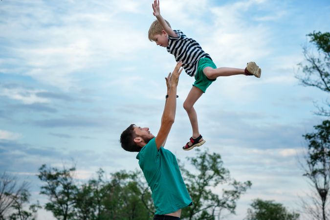 Affectionate father with son outdoor