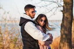 Outdoor shot young loving couple walking