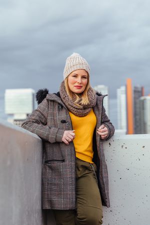 Portrait of blonde woman posing in the city