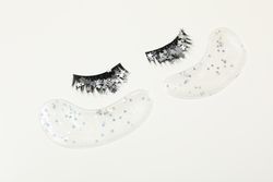 concept of cosmetology tools and beauty treatment, false eyelashes