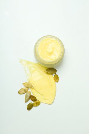 Skin care and face care concept - pumpkin cosmetic