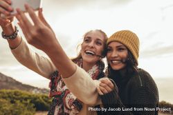 Two women taking selfie while hiking 5oqN1b