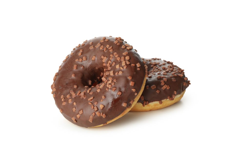 Tasty baked donuts isolated on plain background