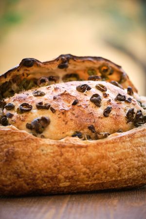 Delicious freshly baked rustic bread with olives