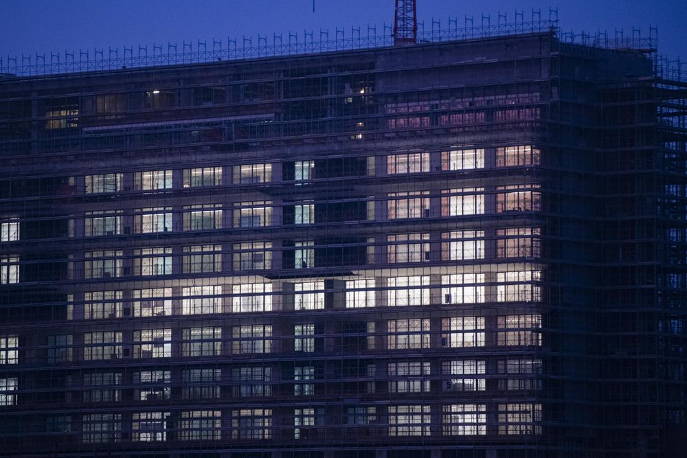 Lit business building at night