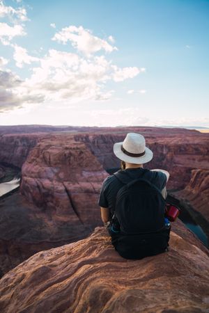 Bearded traveler looking at canyon