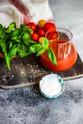 Fresh tomato juice with cherry tomatoes and garnish