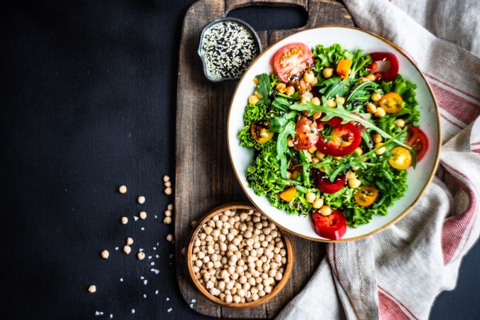 Top view of bowl of vegetable salad with garbanzo beans