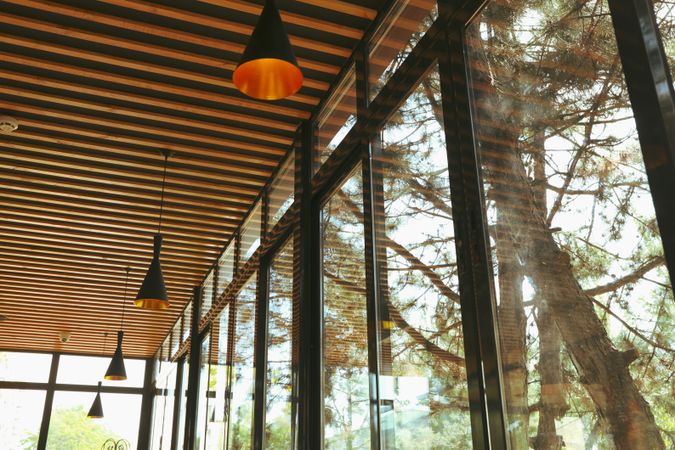 Window and stylish wooden ceiling in restaurant