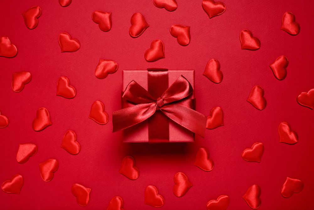 Red box with bow on red background