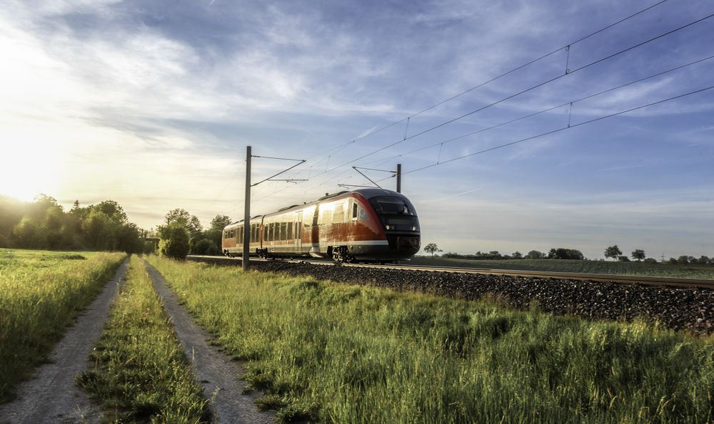 Passenger train on sunny day of summer
