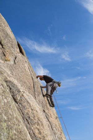 Man climbing a rock