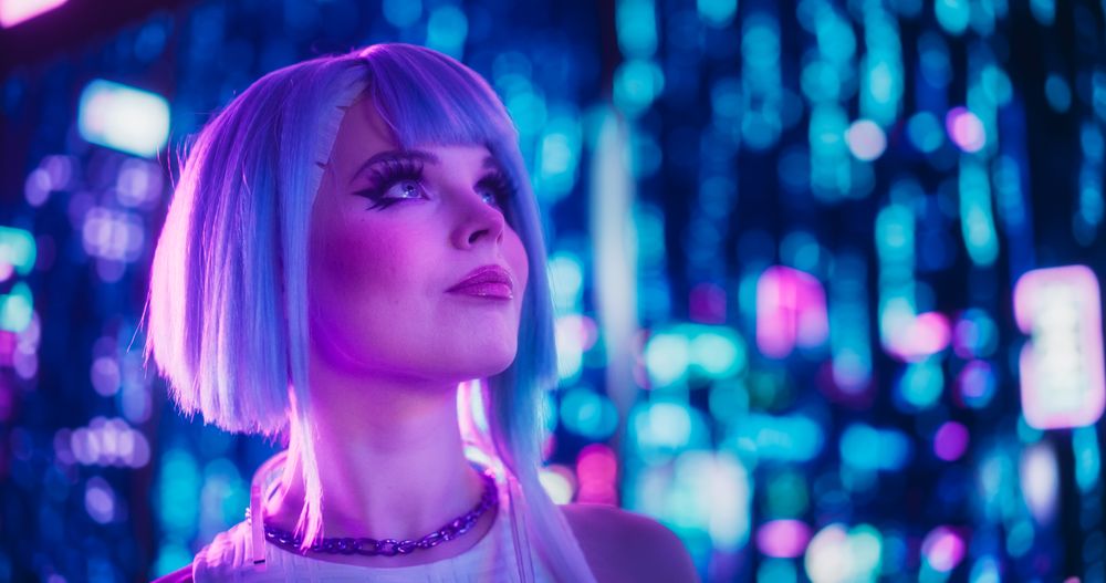 Cinematic Portrait of a Stylish Young Cosplay Model with Blue Hair Wandering Around a Futuristic Cybernetic City
