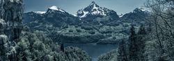Gloomy panorama with the Swiss Alps peaks